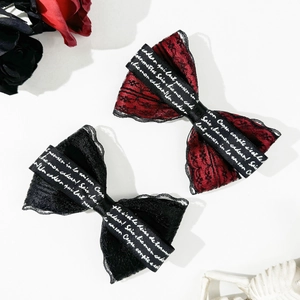 Dark gothic lace bow hair clips set with ribbon lettering in red and black