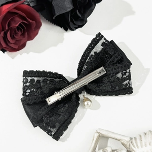 Elegant vintage black lace bow hair clip with white pearl pendant in gothic romantic style