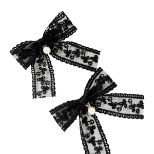 Pair of elegant black lace bow hair clips with white pearl charms for women