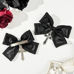 Gothic black satin ribbon hair clips with silver cross charms in a dark aesthetic style