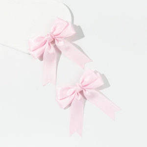 Set of two soft pink satin bow hair clips with elegant long tails for girls