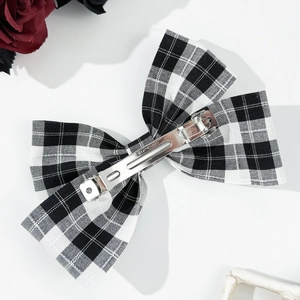 Elegant black and white plaid bow hair clip with vintage spring metal fastener