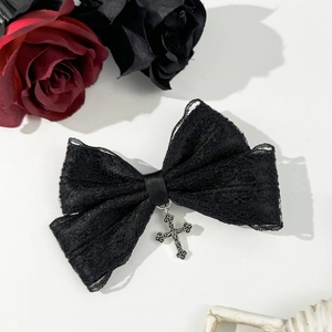 Gothic black lace bow hair clip with vintage silver cross pendant in a dark aesthetic style