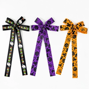 Three-piece Halloween bow hair clips set with ghosts, pumpkins and spooky patterns