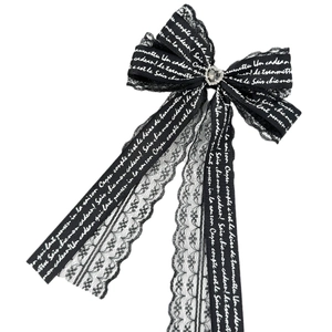 Barrette nœud en dentelle avec cœur en strass et écriture française sur ruban noir