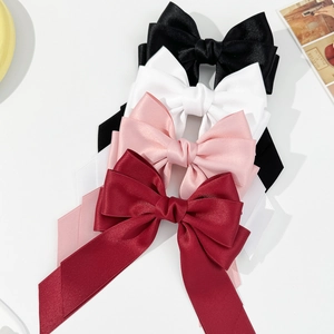 Elegant satin bow hair clips set in black white pink and burgundy colors for women