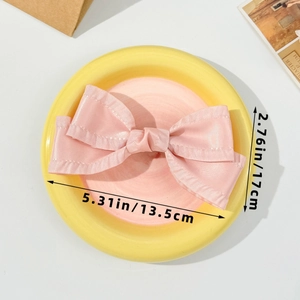 Pink satin bow hair clip size specifications showing 13.5cm length and 17cm width dimensions