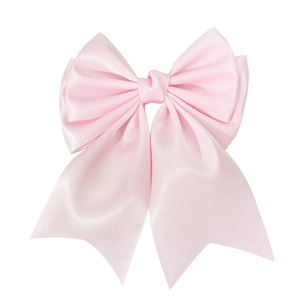 Elegant large pink satin bow hair clip with long streamers for a sweet aesthetic look
