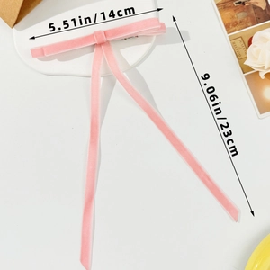 Pink velvet bow hair clip detail with dimensions 5.51in width and 9.06in length