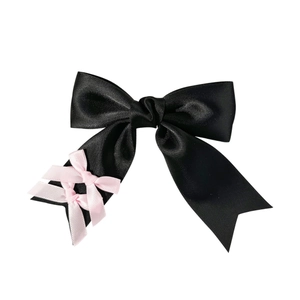Eleganter schwarzer Satin-Haarclip mit rosa Schleifen im süßen Ballett-Stil