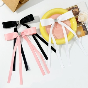 Elegant bow hair clips set with heart rhinestones and long streamers in black pink white