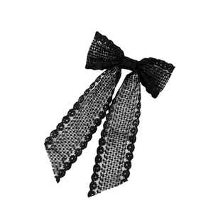 Elegant black lace bow hair clip with long ribbons for a vintage French style look