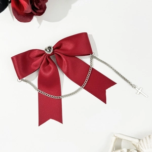 Gothic dark red satin bow hair clip with silver heart gem, chain, and cross pendant detail