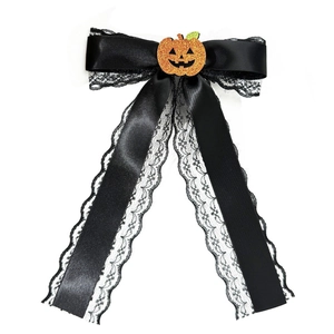 Halloween black lace bow hair clip with orange glitter pumpkin centerpiece and ribbons