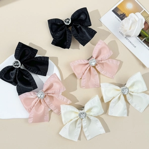 Set aus 6 süßen Haarschleifen mit Strassherzen in Rosa, Schwarz und Creme-Farben
