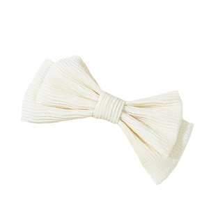 Elegant cream-colored bow hair clip with fine ribbed fabric texture for women