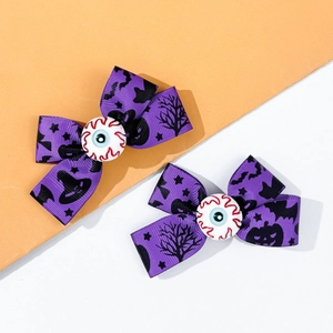 Halloween purple bow hair clip with bat pumpkin prints and realistic eyeball center