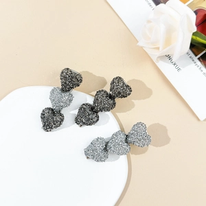 Lot de trois barrettes à cheveux en forme de cœur avec strass brillants en argent