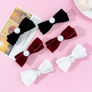 Velvet bow hair clips set with pearls in black, red and white colors for elegant styling
