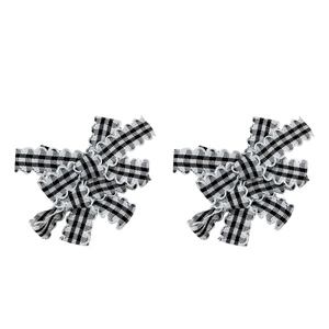 Pair of checkerboard bow hair clips with decorative wavy silver edges for girls