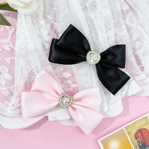 Sweet rhinestone heart bow hair clips in pink and black satin with elegant pearl accents
