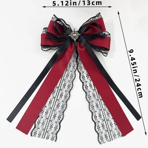Detail of red and black gothic Lolita bow with lace and crystal gem dimensions