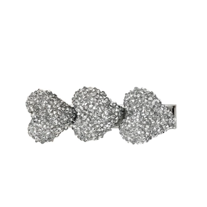 Barrette à cheveux élégante avec trois cœurs en strass et finition argentée