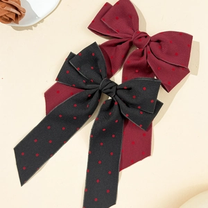Elegant polka dot bow hair clips with long streamers in black and burgundy red