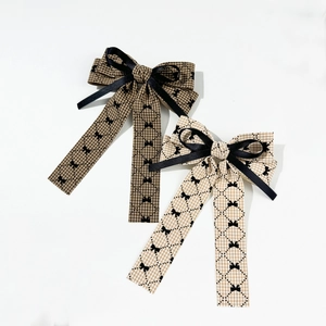 Houndstooth bow hair clips with long ribbons in brown and beige colors, elegant style