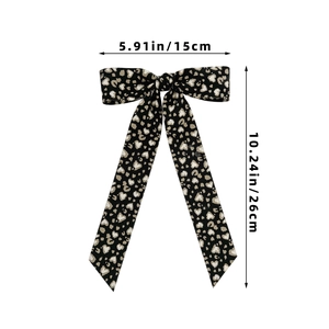 Detailed dimension chart for the leopard print bow hair clip showing 15cm width and 26cm height