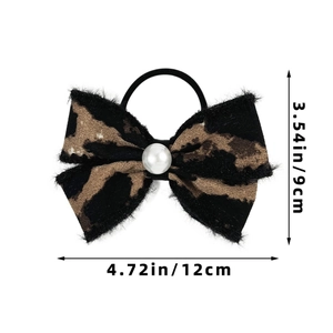 Detail of leopard print bow hair tie with pearl accent and size dimensions in inches