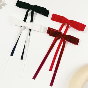 Elegant velvet bow hair clip with long streamers in black, white, red, and burgundy colors