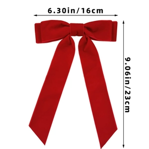 Detailed size view of a large red velvet bow hair clip showing 16cm width and 23cm length