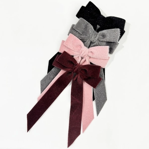 Velvet bow hair clips with long ribbons in black, grey, pink, and burgundy colors