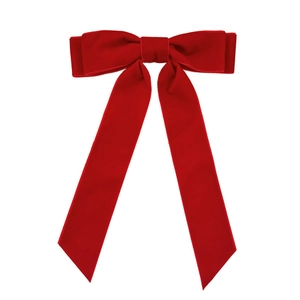 Classic large red velvet bow hair clip with long ribbons on a clean white background