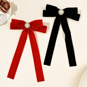 Elegant vintage velvet bow hair clips with pearl sunflower accents in red and black