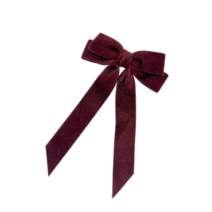 Elegant wine red velvet hair bow with long streaming ribbons and metallic spring clip