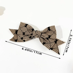 Détail de la pince à cheveux à carreaux de 17 cm avec mesures et texture du tissu