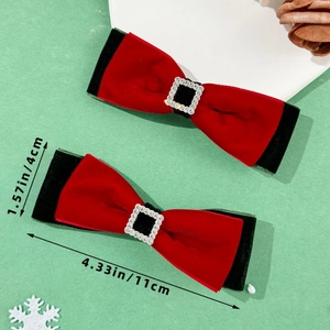 Detail view of red velvet bow hair clips with rhinestones and precise size measurements
