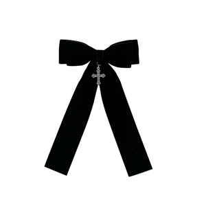 Gothic black velvet bow hair clip featuring a vintage silver metal cross pendant detail