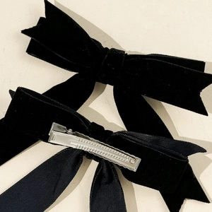 Elegant black velvet bow hair clips with silver metal alligator grip for women
