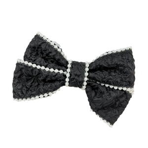 Elegant black bow hair clip with pearl trim and vintage jacquard fabric design