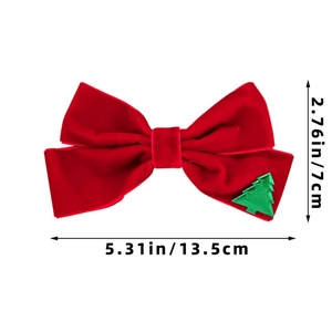 Detailed view of red velvet Christmas bow clip with dimensions 13.5cm by 7cm