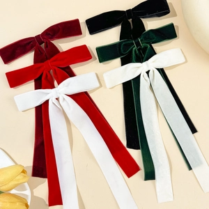 Elegant velvet bow hair clips set in multiple colors with long ribbon streamers