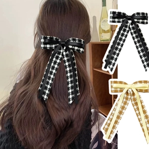 Elegant houndstooth bow hair clips with long ribbons in tweed fabric and vintage style