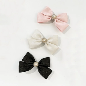 French pearl bow hair clips in pink beige and black with elegant rhinestone sunflower center