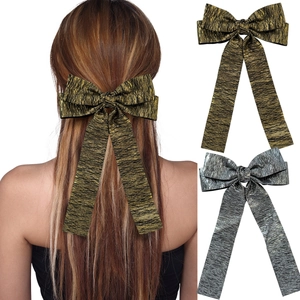 Chic metallic pleated bow hair clip set in gold and silver with elegant long ribbons