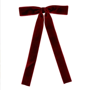 Elegant deep red velvet bow hair clip with long streamers on a clean white background