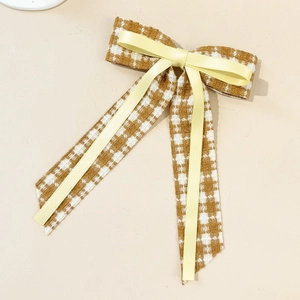 Elegant houndstooth ribbon bow hair clip in brown and beige vintage French style