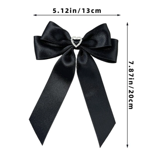 Dimensioni del fermaglio per capelli a fiocco nero con cuore di strass lucidi